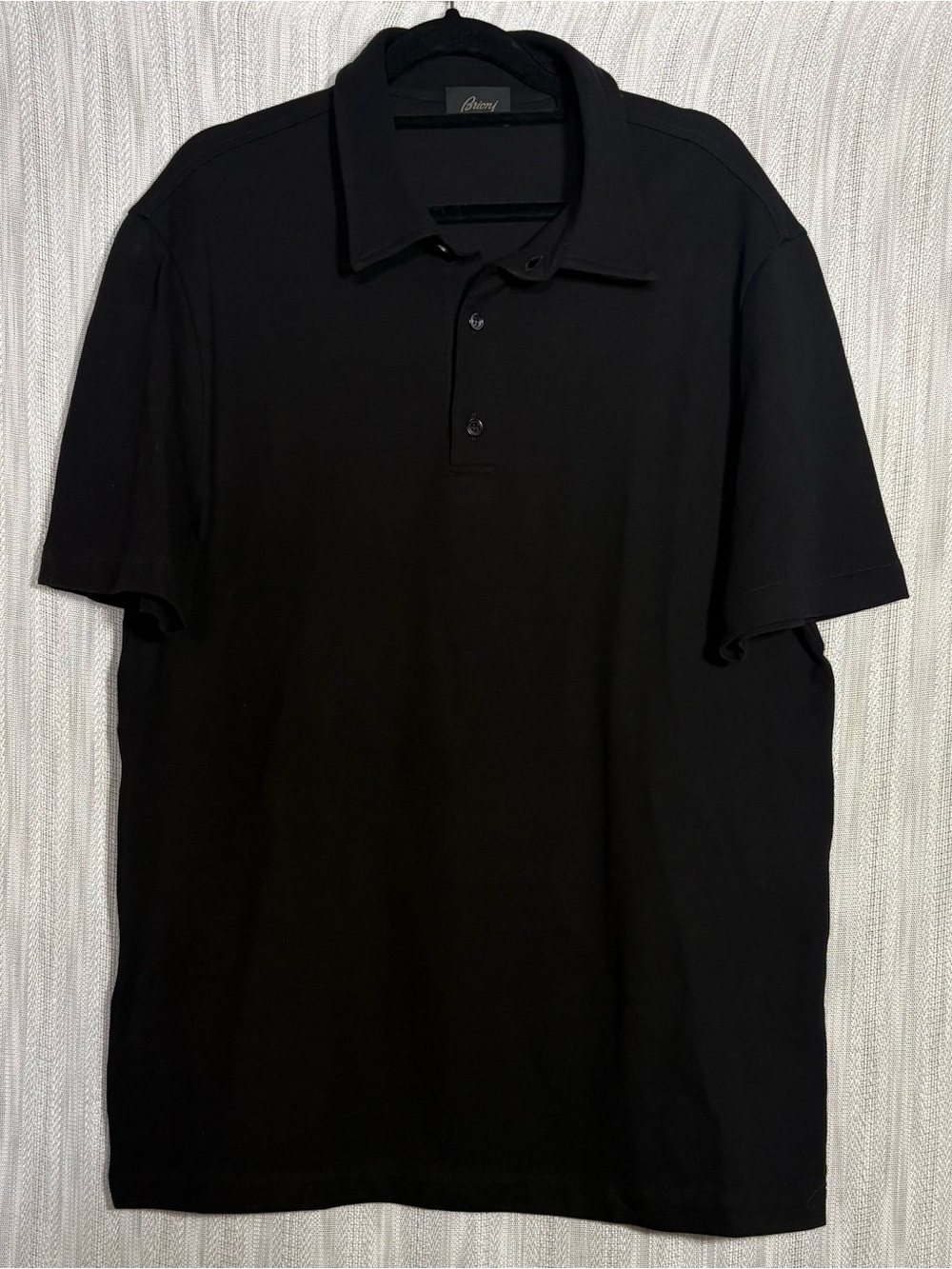 Brioni Black Short-Sleeve Cotton Polo retails at $625